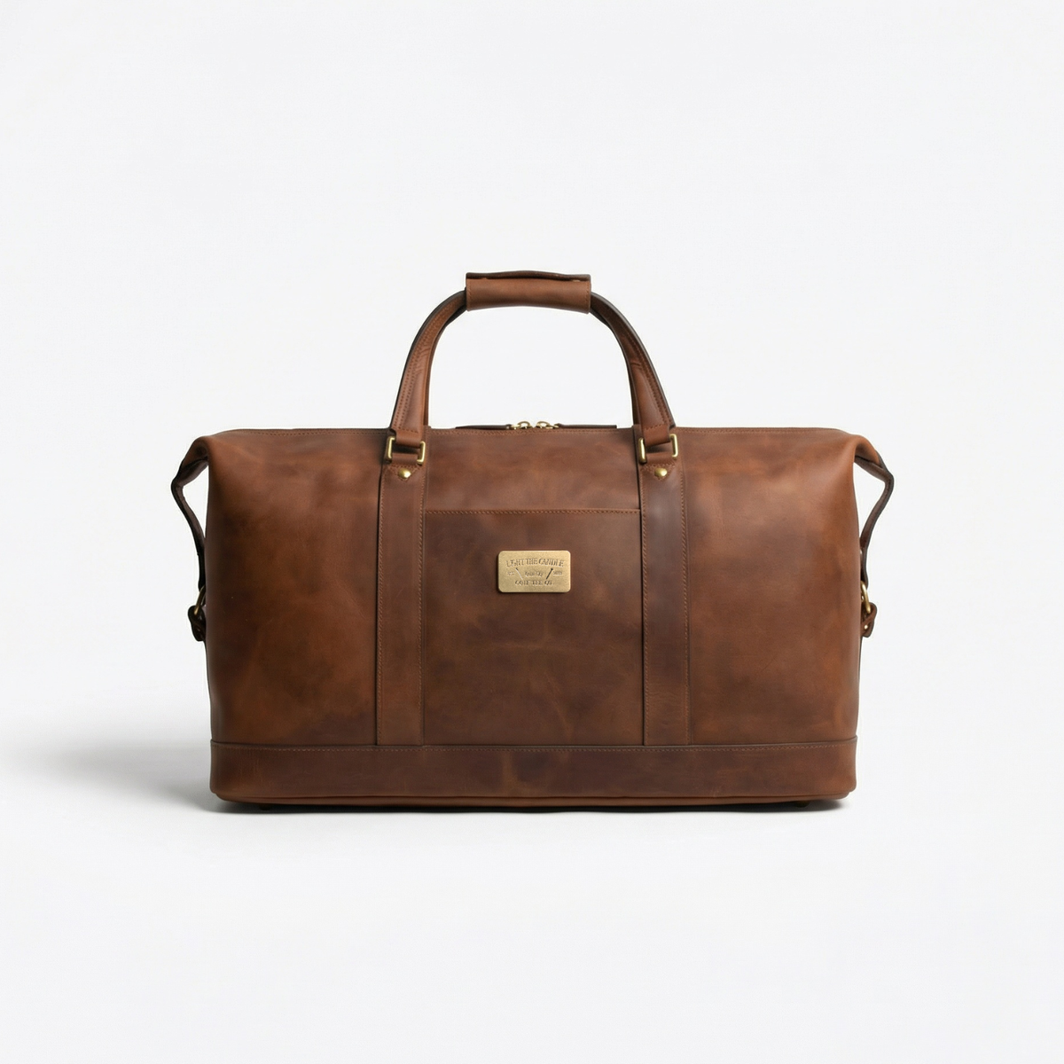 Brown leather duffel, Light The Candle Tees